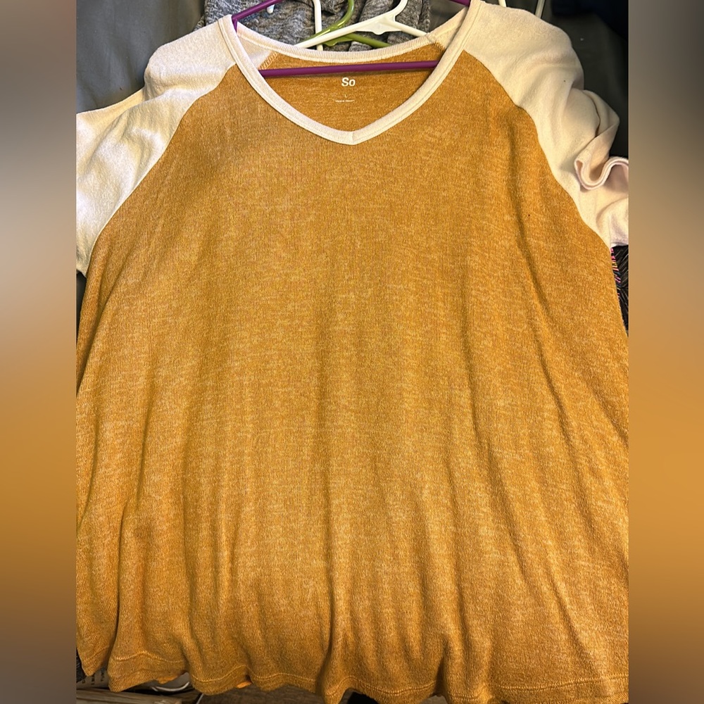 SO branded yellow tee with white sleeves